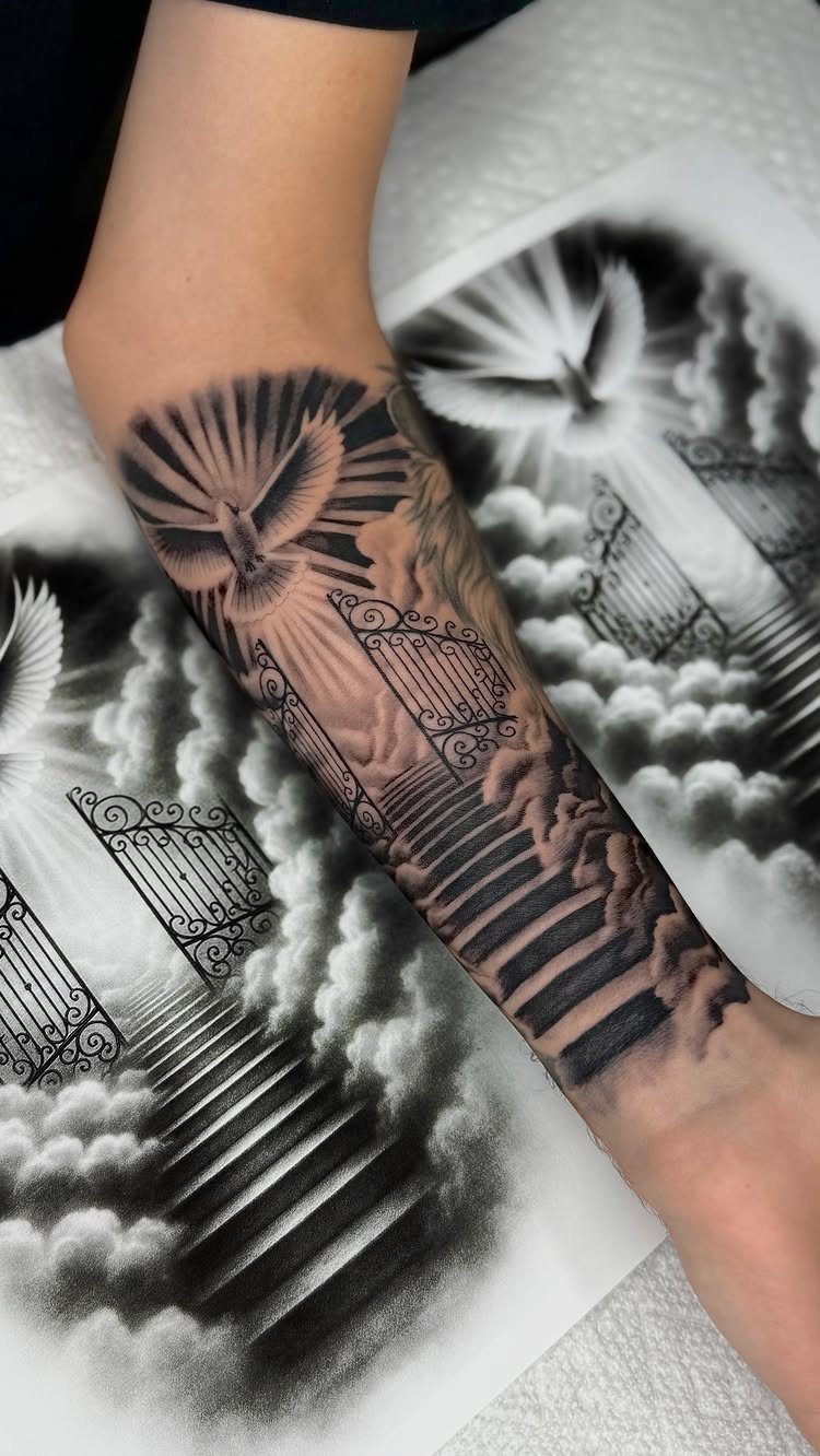 Dove tattoo on a forearm featuring stairs and gates among clouds in black ink