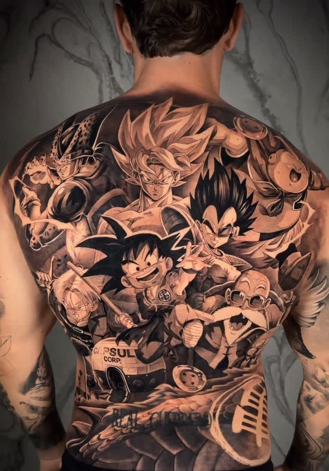 Detailed black and grey back tattoo featuring various Dragon Ball characters in a collage.