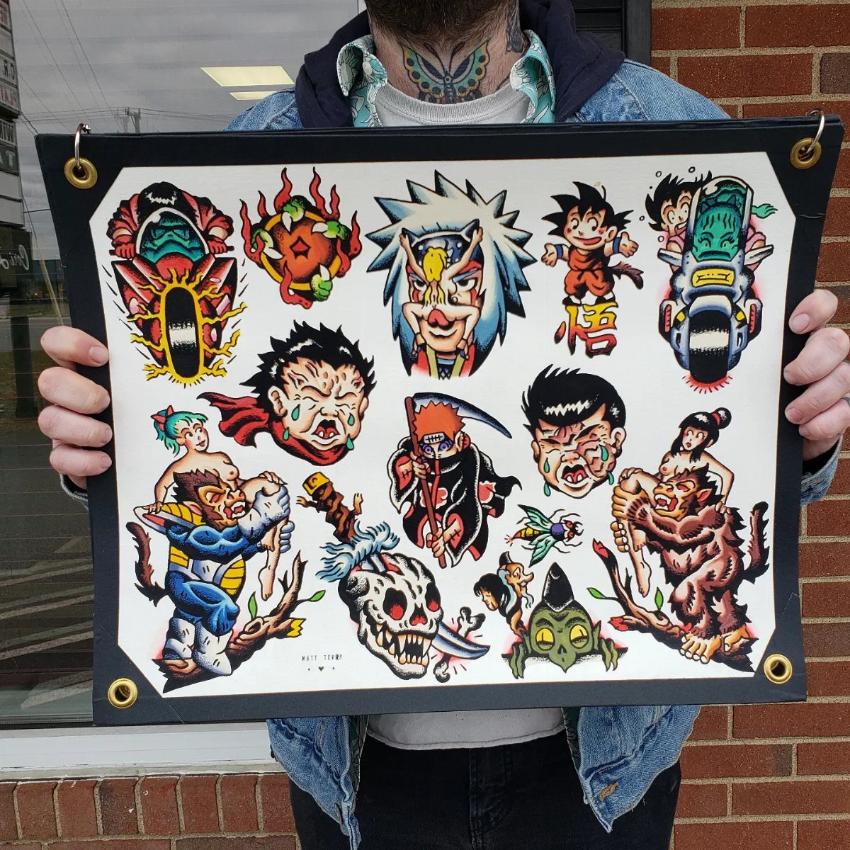 Tattoo flash sheet featuring traditional style Dragon Ball character designs on white paper.