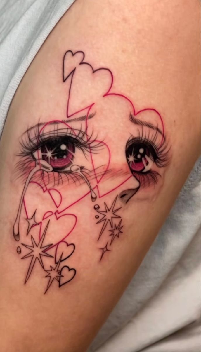 Tattoo of crying eyes surrounded by red hearts and small stars on skin