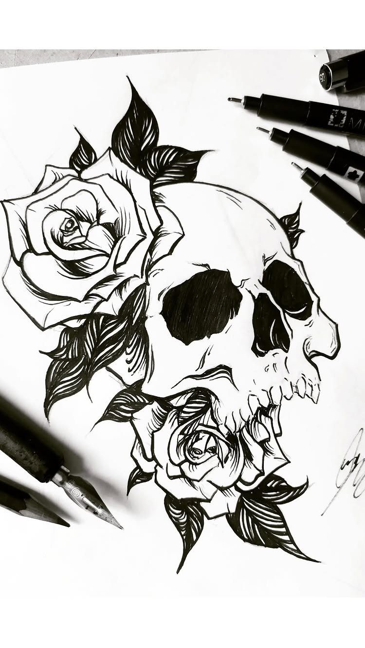Black ink drawing of a human skull entwined with blooming roses and leaves.