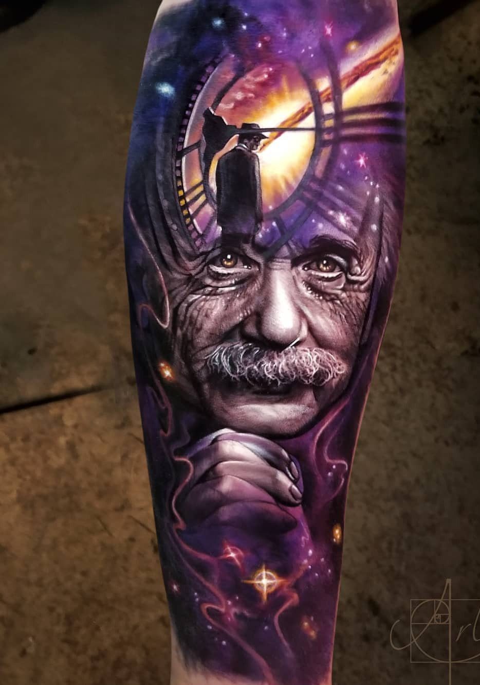 Detailed tattoo of an elderly man's face merging into a cosmic clock scene.